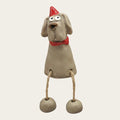 Julhund med hengende ben, H 9,5cm, keramikk